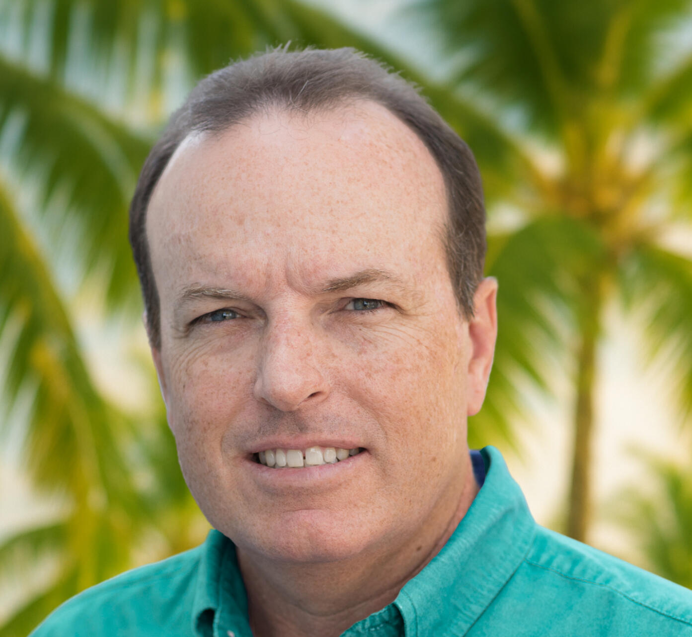 Jim Signor portrait with palm trees in Key Largo, Florida Keys